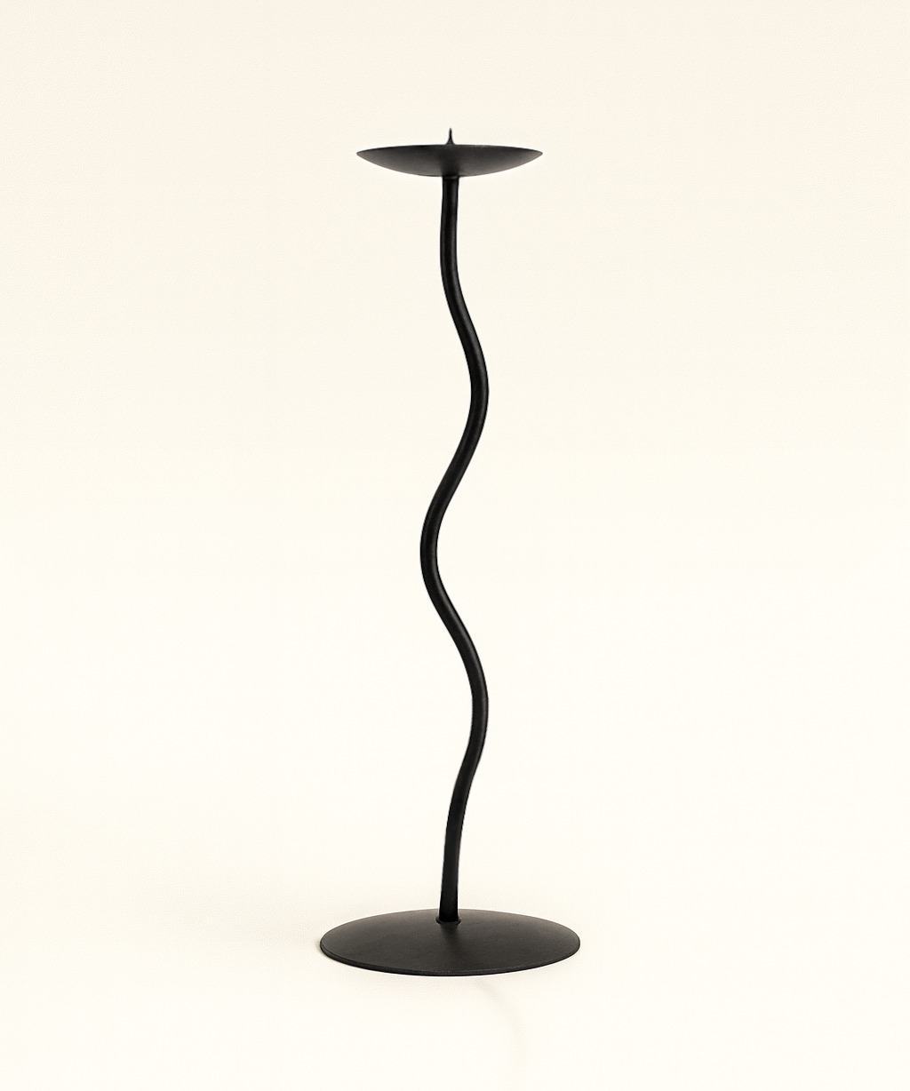 Handmade wrought iron candlestick with a single wavy stem